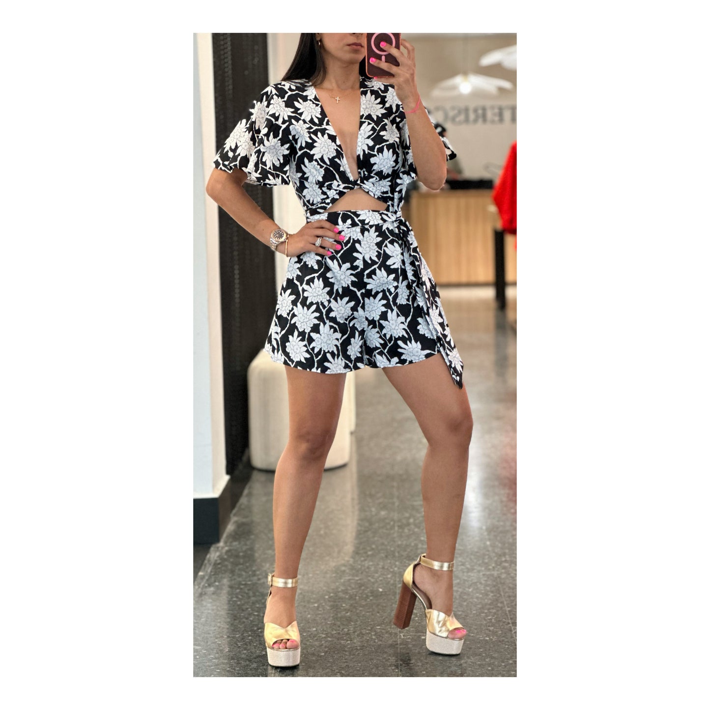 SHORT SLEEVE V-NECK CUT OUT FLORAL ROMPER