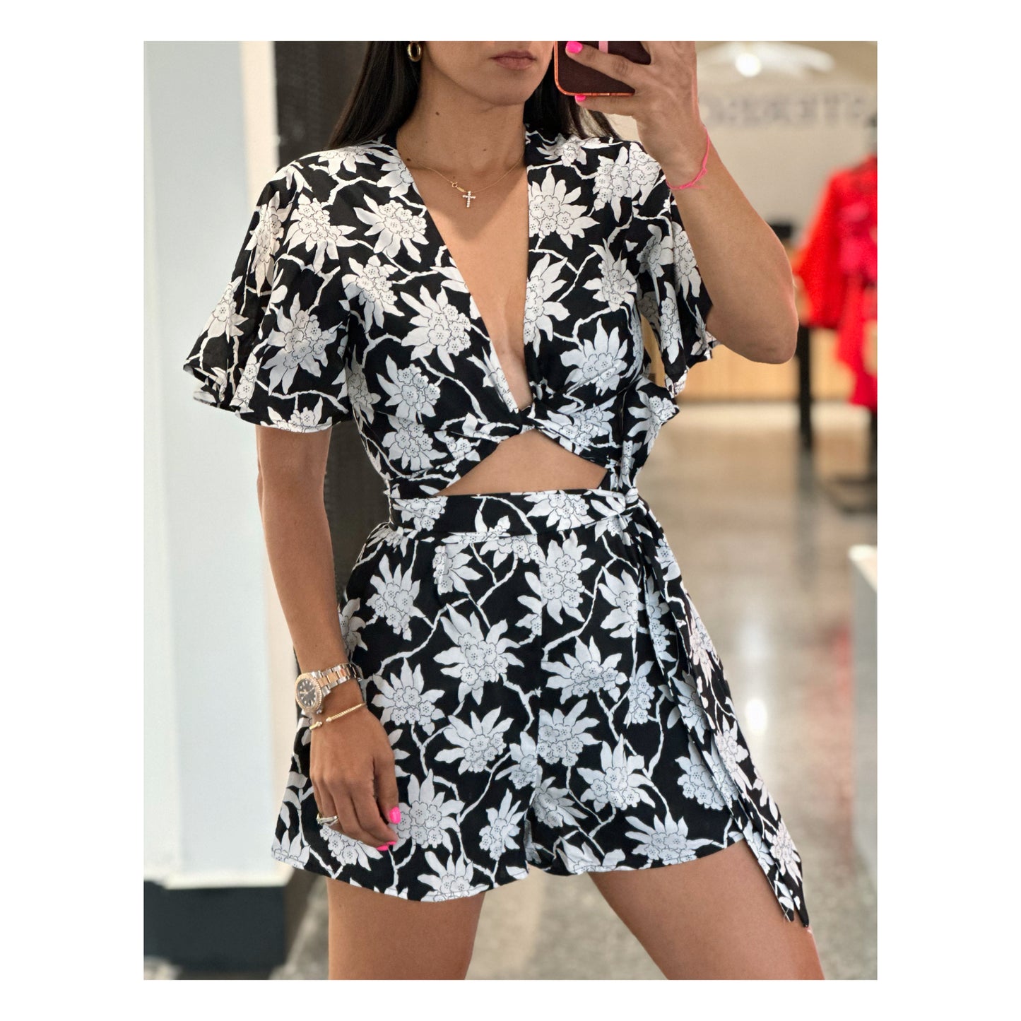 SHORT SLEEVE V-NECK CUT OUT FLORAL ROMPER