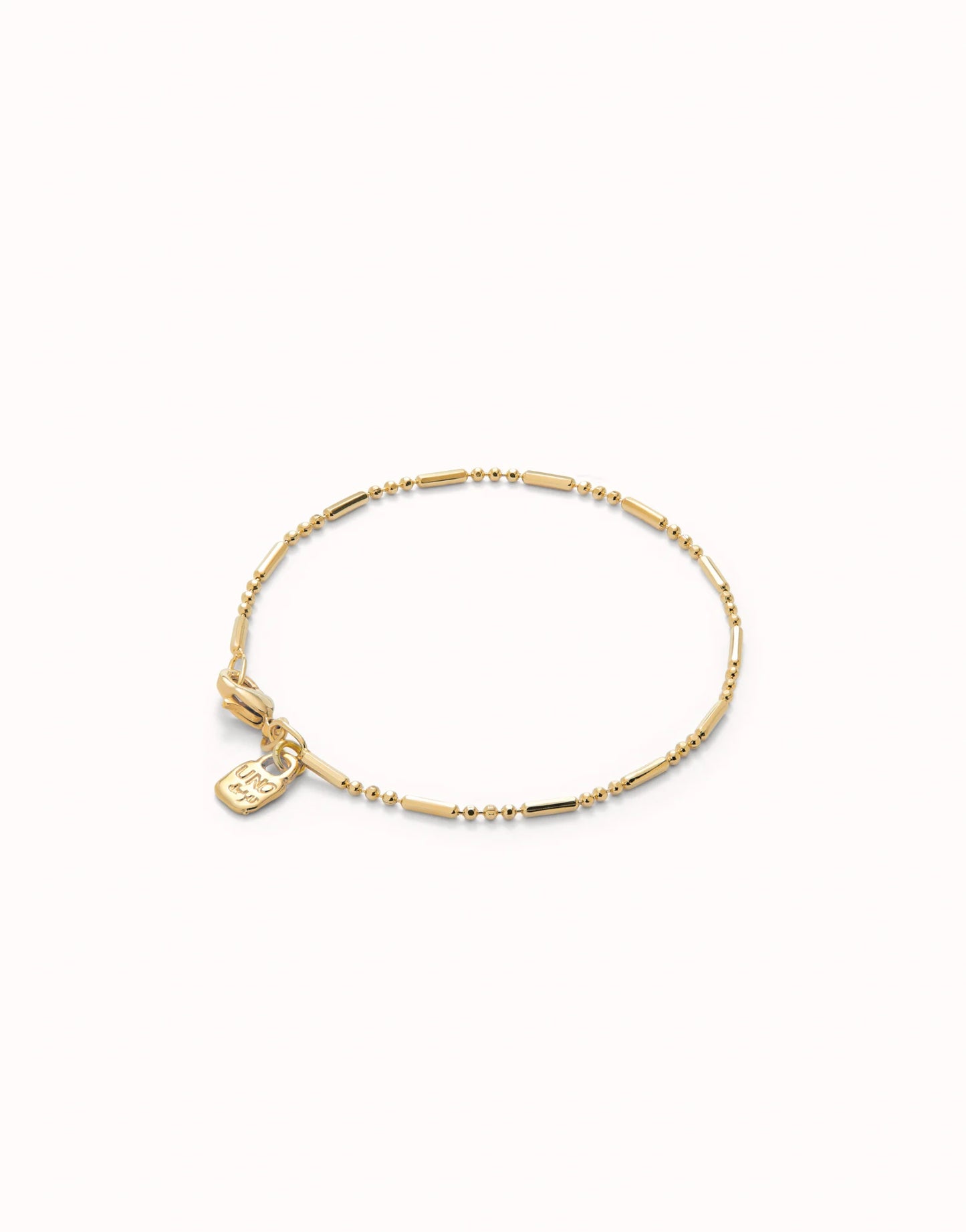 Uno de 50 18K gold-plated bracelet with beads and elongated pieces