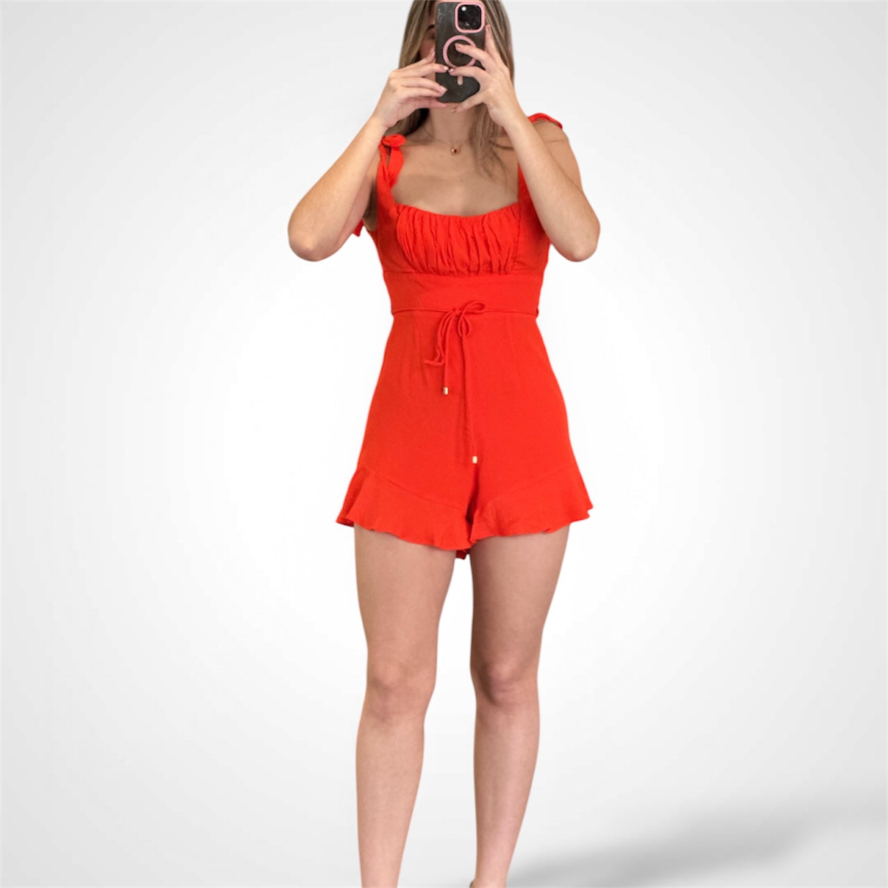 ORANGE RIBBON STRAP WAIST TIE RUFFLE HEM ROMPER