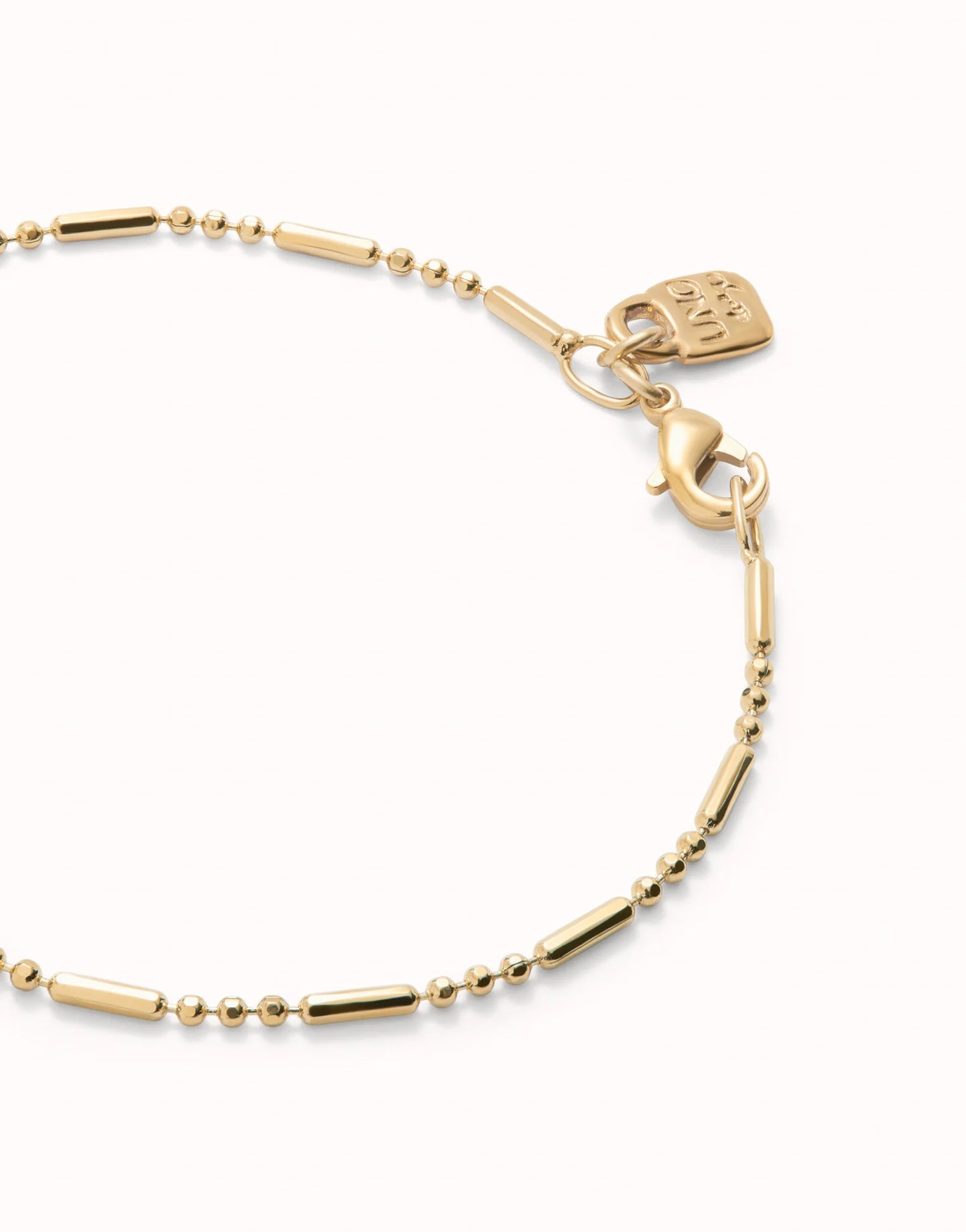 Uno de 50 18K gold-plated bracelet with beads and elongated pieces