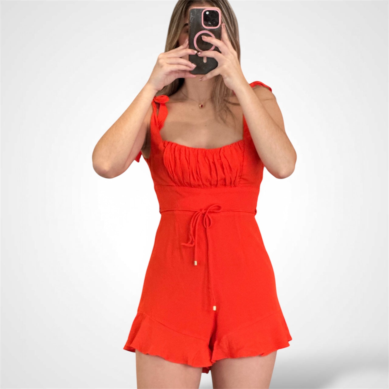 ORANGE RIBBON STRAP WAIST TIE RUFFLE HEM ROMPER